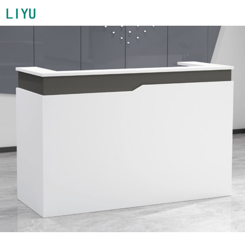 Modern office side table with drawers in a corporate reception area