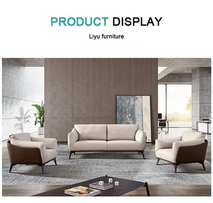 Side angle of the genuine leather office sofa highlighting the natural hide texture